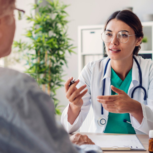 a doctor talking to a patient
