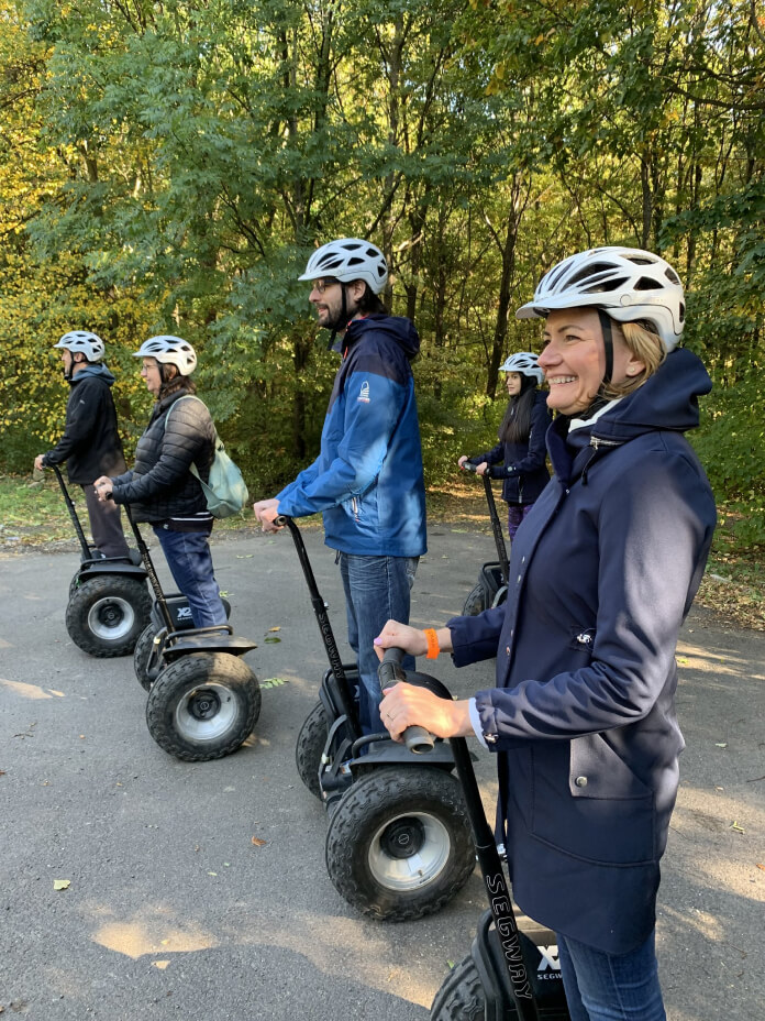 a group of people on segways