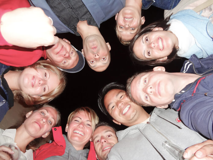 a group of people posing for the camera